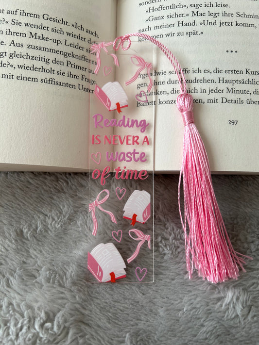 Lesezeichen „reading is never a waste of time“ 🎀⏰